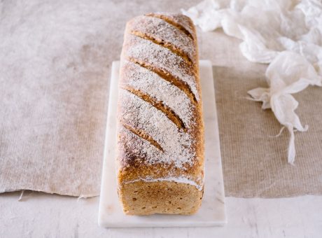 a loaf of bread on a marble board