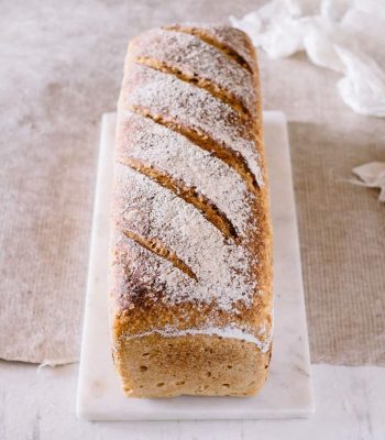 a loaf of bread on a marble board